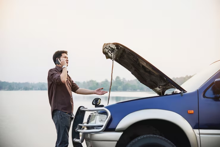 man-try-fix-car-engine-problem-local-road-chiang-mai-thailand-1150-10489 24-hour tow truck in Brownwood, TX